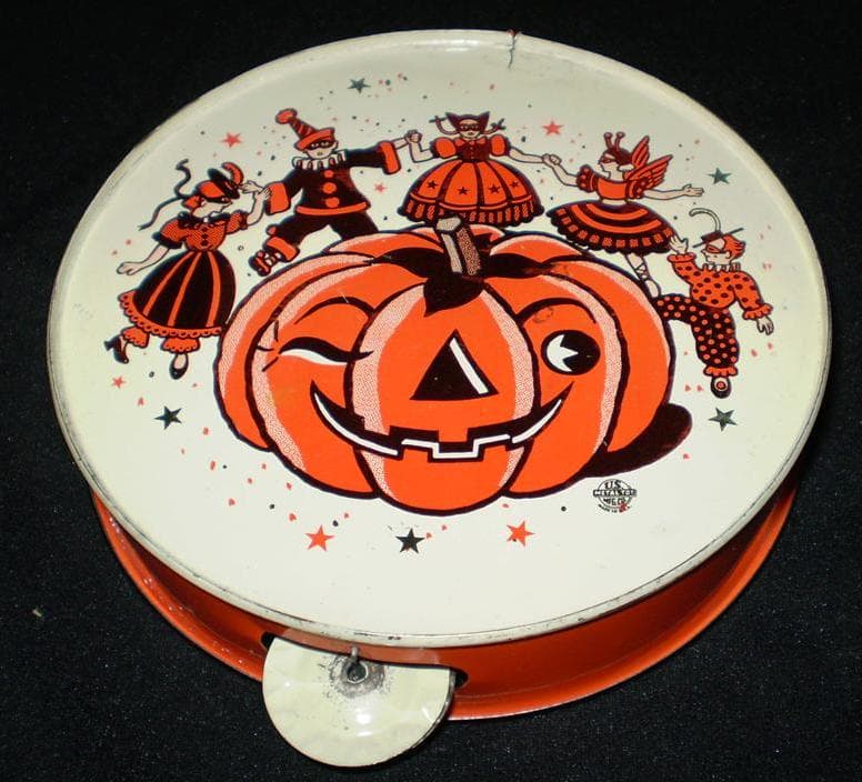 Vintage tin toy drum with Halloween lithograph artwork