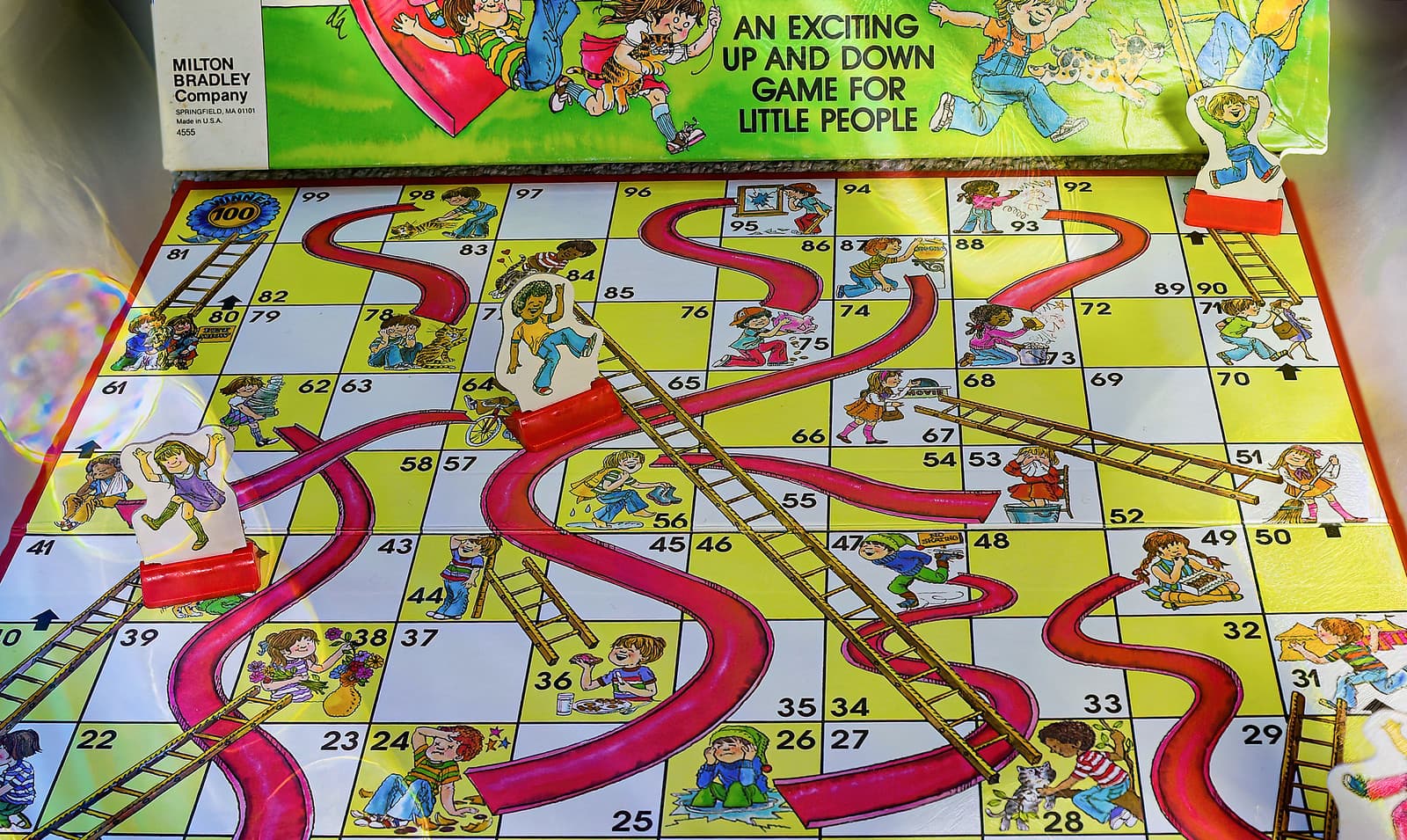Milton Bradley Chutes and Ladders board game with retro edition box