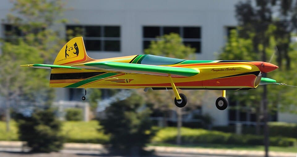 Control-line model airplane in flight