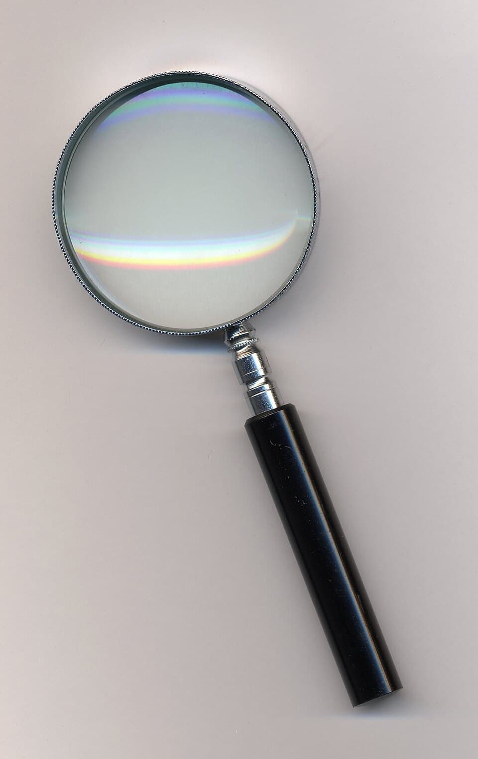 Magnifying glass with black handle