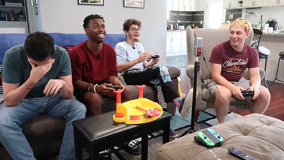 People playing the Pie Face Havocado tabletop game