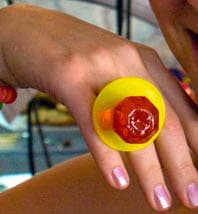 Ring Pop candy worn on a hand