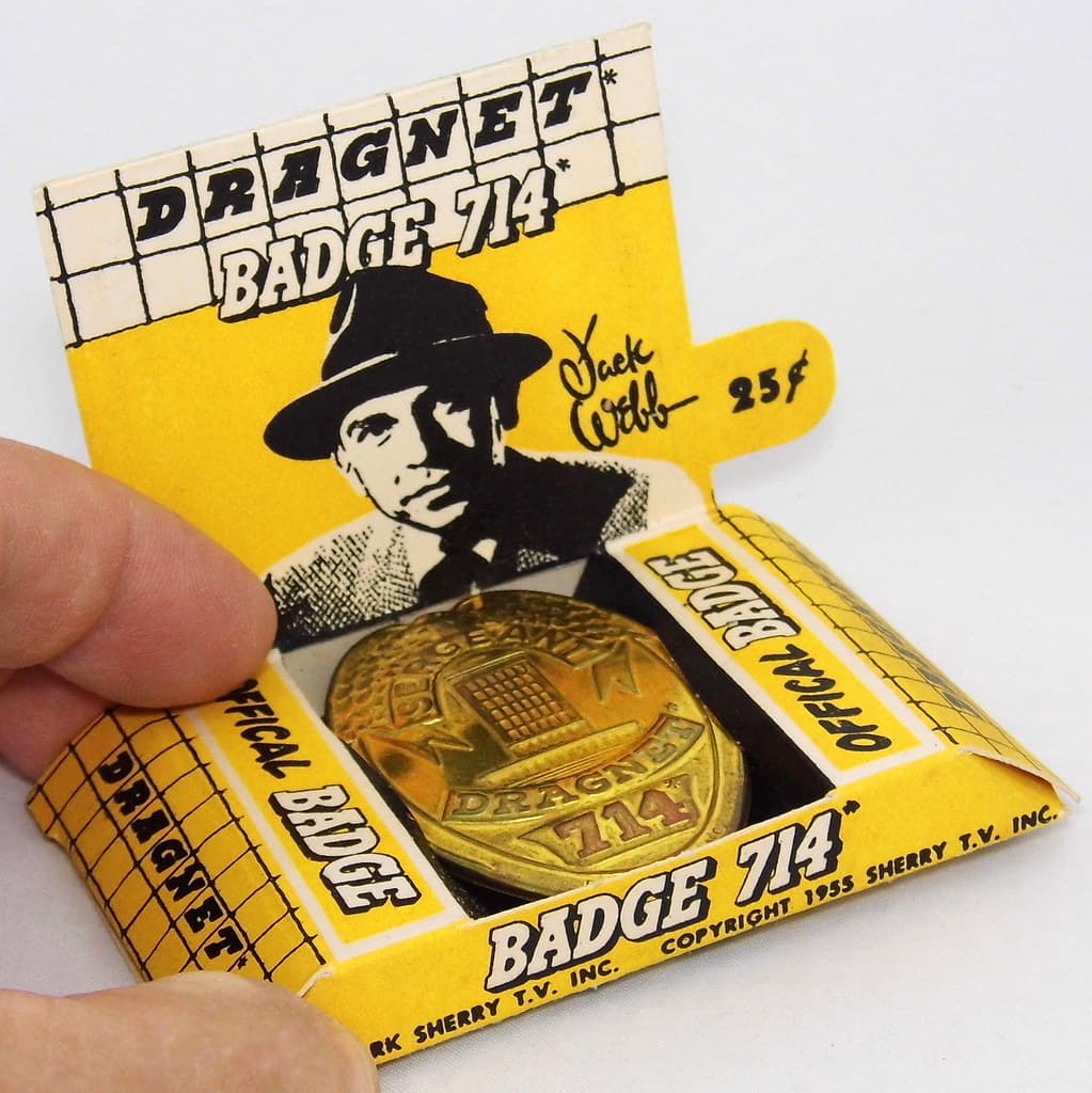 Vintage Dragnet toy police badge in its package