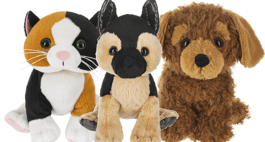 Three Webkinz plush pets: a calico cat, German shepherd and brown puppy