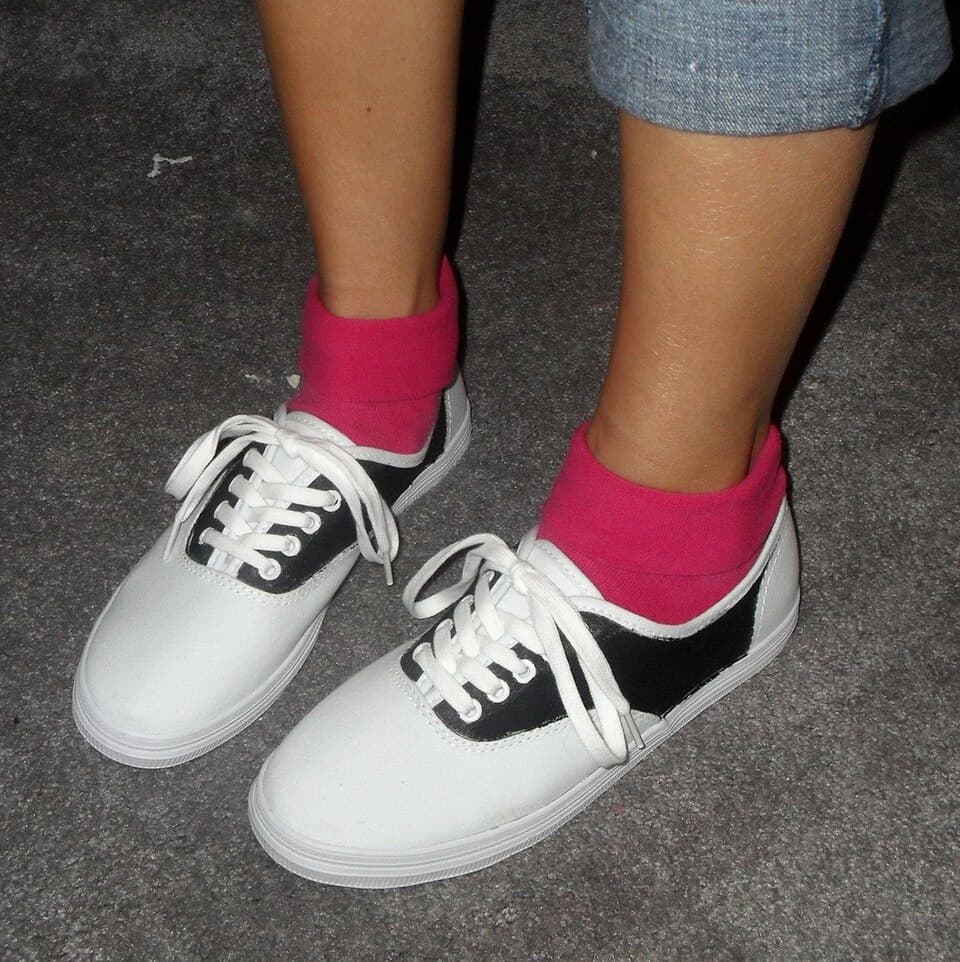 Two-tone black and white saddle shoes