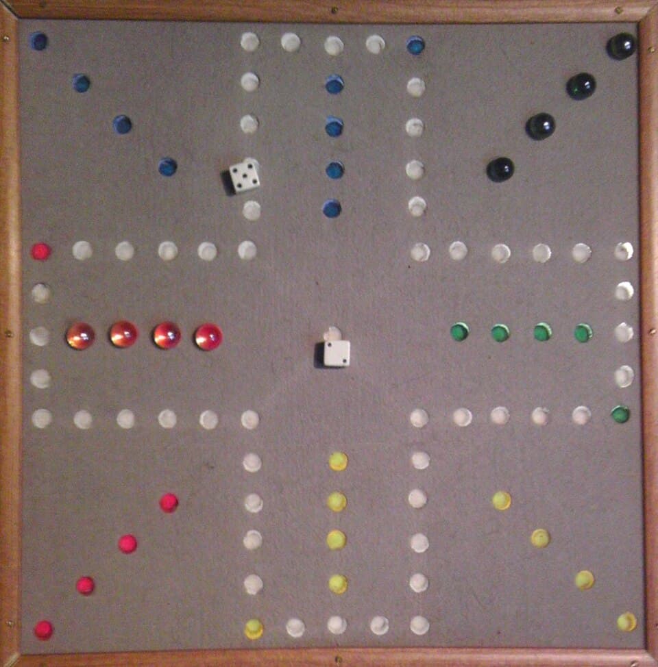 Wahoo-style wooden marble board game